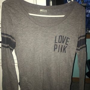 Long sleeve PINK shirt.